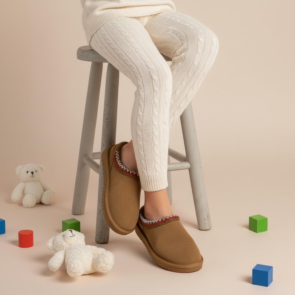 image:imageCUSHIONAIRE Keto Genuine Suede Leather Kids Slippers for Boys and Girls Cozy SlipOn Mule House Shoes with Faux Fur Lining Cushioned Memory Foam ComfortChestnut