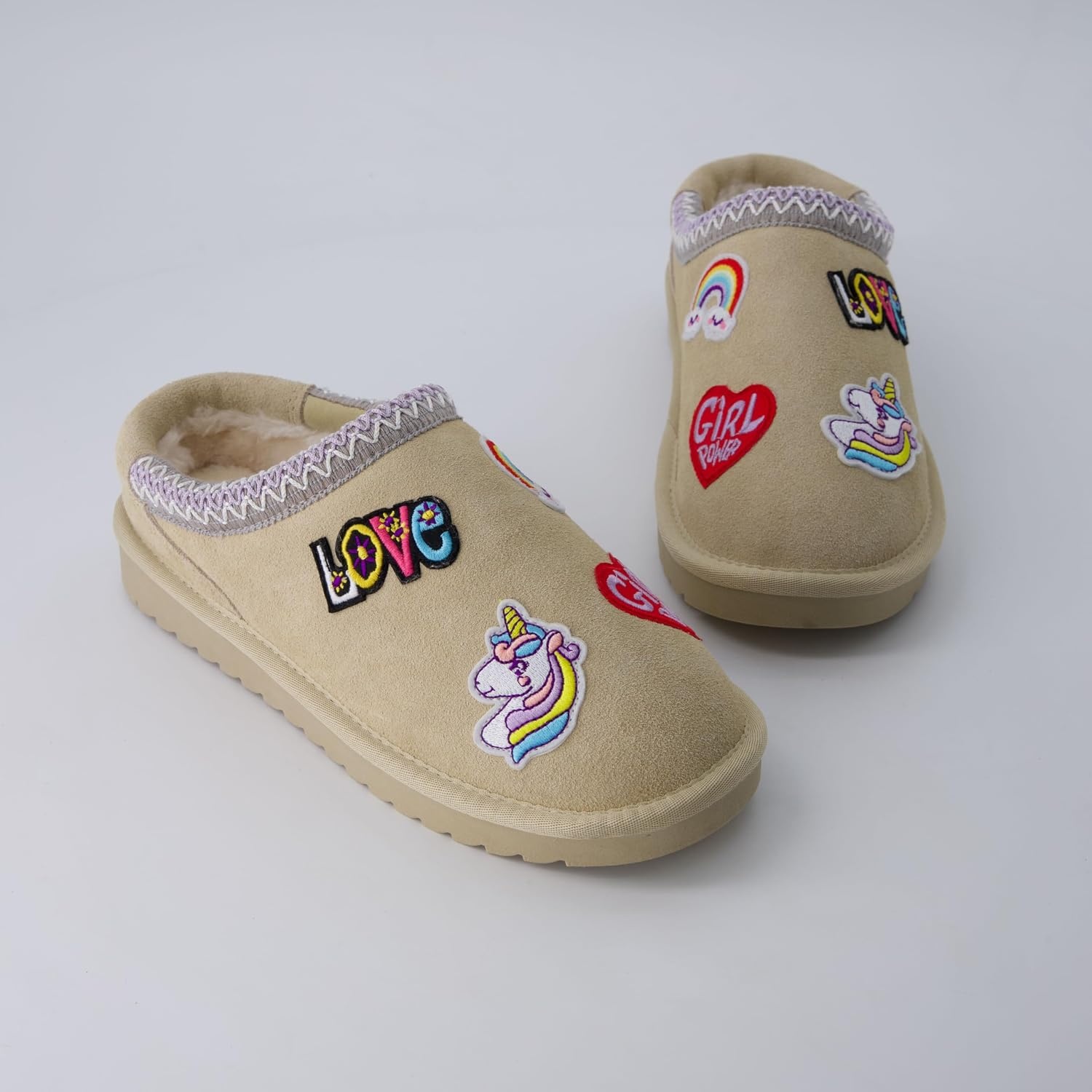 image:imageCUSHIONAIRE Keto Genuine Suede Leather Kids Slippers for Boys and Girls Cozy SlipOn Mule House Shoes with Faux Fur Lining Cushioned Memory Foam ComfortSand