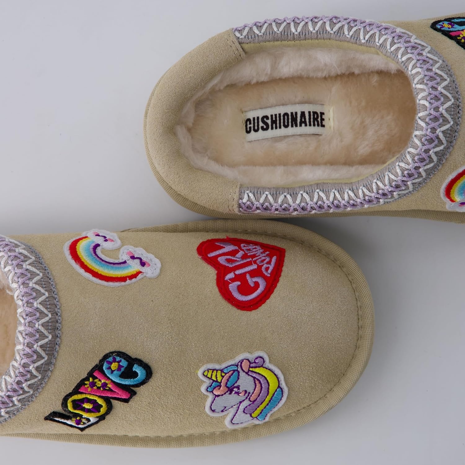 image:imageCUSHIONAIRE Keto Genuine Suede Leather Kids Slippers for Boys and Girls Cozy SlipOn Mule House Shoes with Faux Fur Lining Cushioned Memory Foam ComfortSand