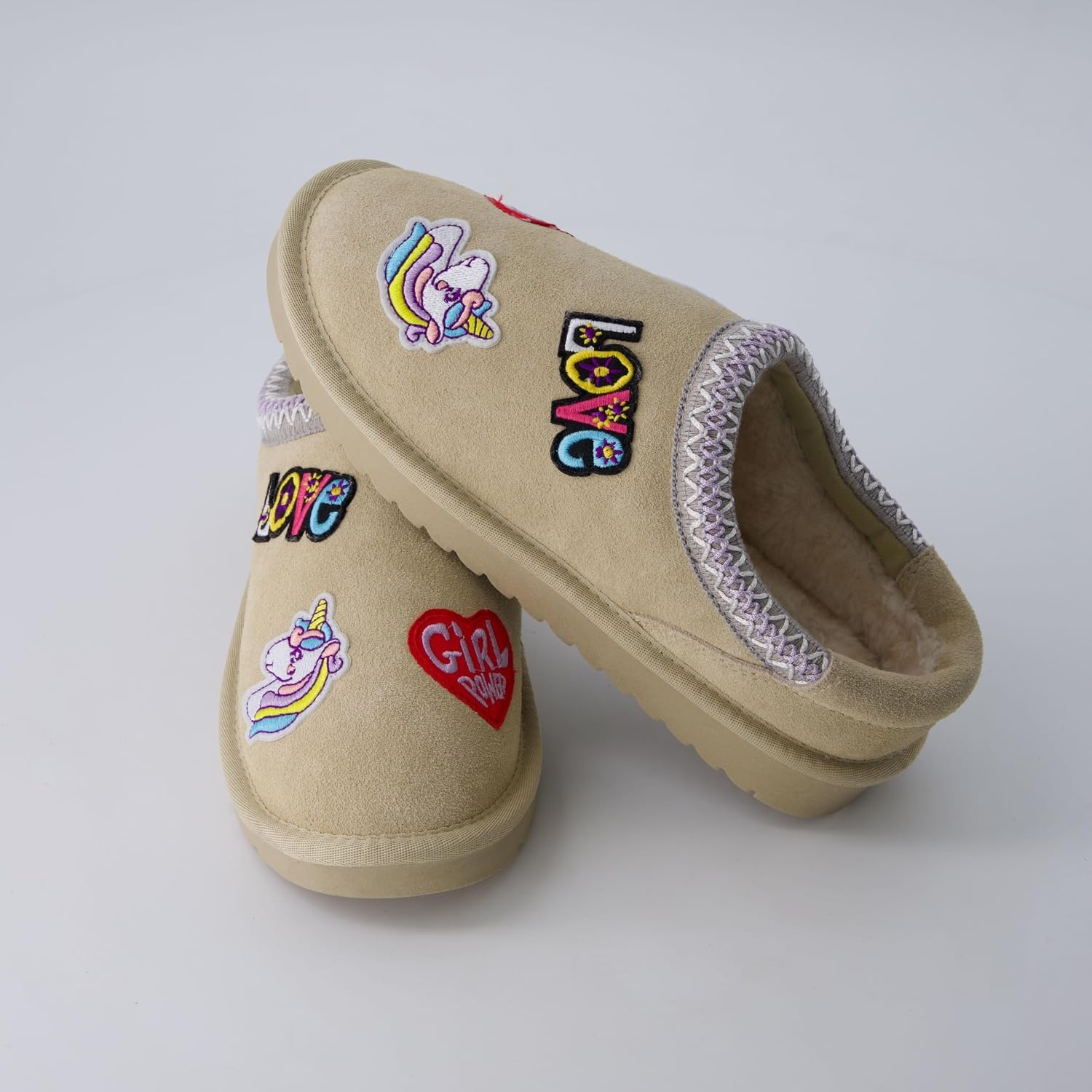 image:imageCUSHIONAIRE Keto Genuine Suede Leather Kids Slippers for Boys and Girls Cozy SlipOn Mule House Shoes with Faux Fur Lining Cushioned Memory Foam ComfortSand