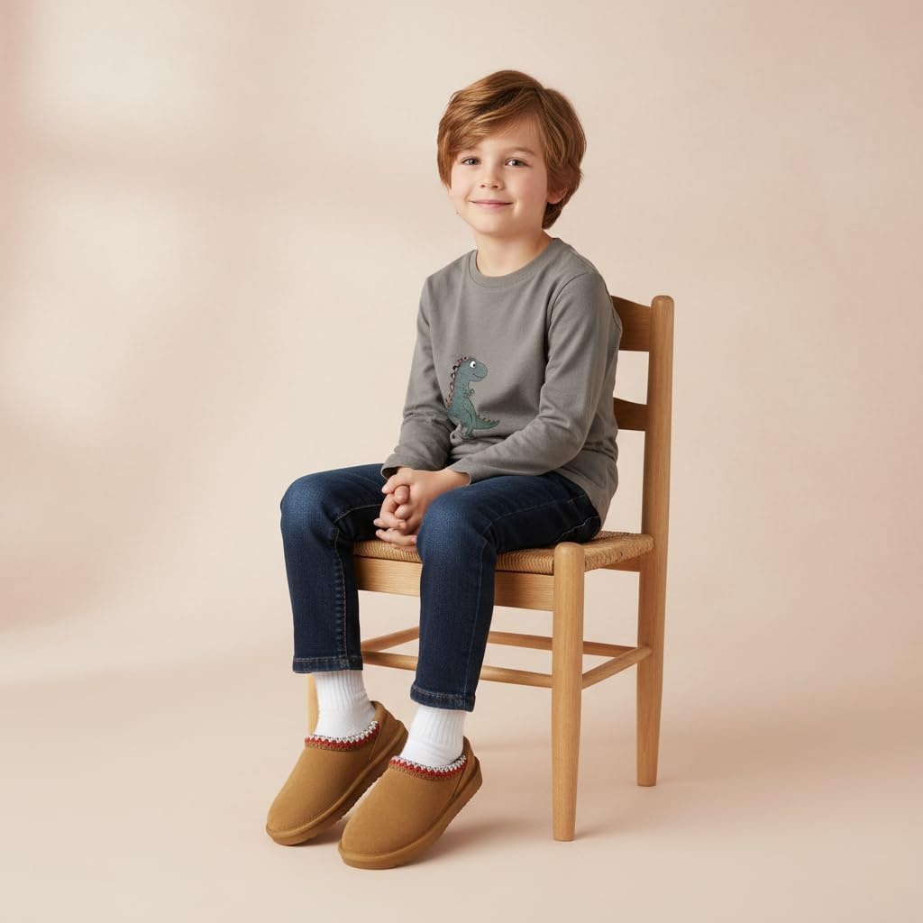 image:imageCUSHIONAIRE Keto Genuine Suede Leather Kids Slippers for Boys and Girls Cozy SlipOn Mule House Shoes with Faux Fur Lining Cushioned Memory Foam ComfortChestnut