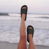 CUSHIONAIRE Feather EVA Slides for Women – Comfortable Slip On Womens Slippers, Indoor Outdoor Shower Shoes, Beach Essential Cloud Slides(Black)