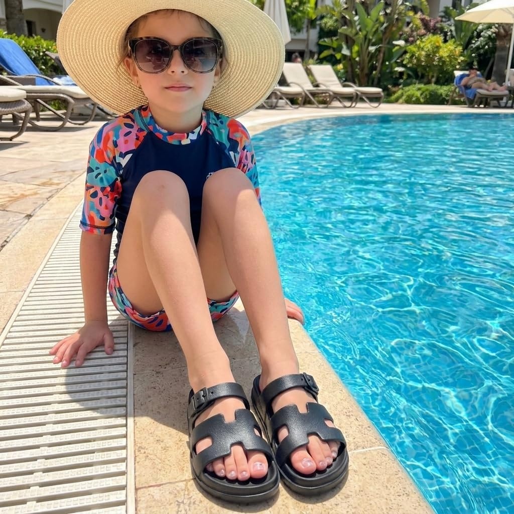 image:imageCUSHIONAIRE Orbit Kids Sandals Lightweight Waterproof EVA Slides with Adjustable Buckle Everyday Casual Comfort Girls SandalsBlack