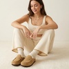 CUSHIONAIRE Casey Genuine Suede Moccasin Slippers for Women, Cozy House Shoes with Moc Toe and Penny Loafer Strap(Sand)