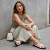 CUSHIONAIRE Raz Thong Strappy Sandals for Women, Minimalist Flat Sandals with Decorative Ring Accents(White)