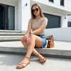 CUSHIONAIRE Tory Strappy Flat Sandals for Women, Toe Ring Sandals with Adjustable Buckle Ankle Strap, Wrap Style(Whiskey)
